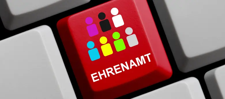 Bild einer Tastatur mit einer roten Taste "Ehrenamt"